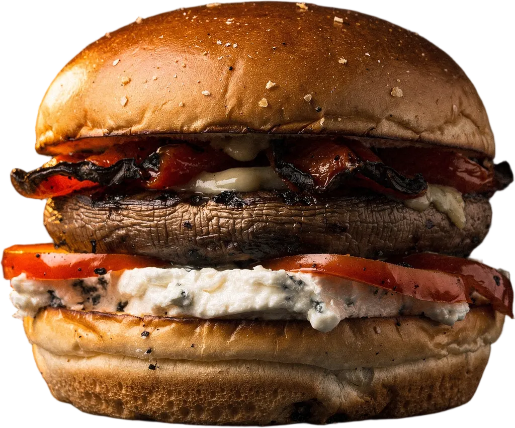 Ein vegetarischer Burger mit Portobello, Ziegenkäse und Ofenpaprika